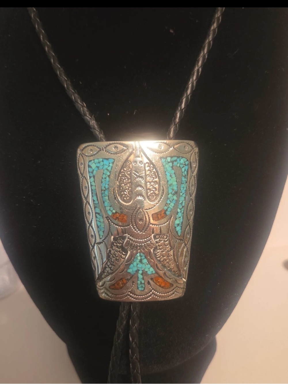 Sterling Silver Jimmie Nezzie
Navajo Turquoise Coral Bolo Tie
Sterling Tips